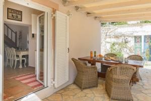 Fotografie z fotogalerie ubytování LiLy's Garden House v destinaci Ágios Rókkos