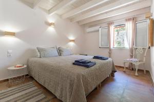 Fotografie z fotogalerie ubytování LiLy's Garden House v destinaci Ágios Rókkos