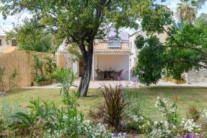 Fotografie z fotogalerie ubytování LiLy's Garden House v destinaci Ágios Rókkos