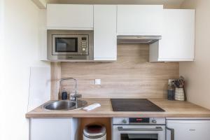 Kuchyňa alebo kuchynka v ubytovaní Appartement Fellas - Welkeys