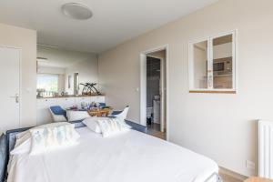 Posteľ alebo postele v izbe v ubytovaní Appartement Fellas - Welkeys