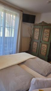 Postel nebo postele na pokoji v ubytování Knaller der Reiterbauernhof