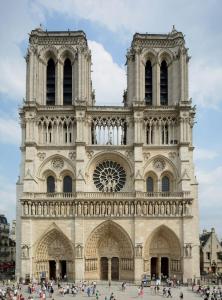 a large cathedral with people walking in front of it at 04 - Chambre avec lit double proche Paris et transports WIFI in Saint-Denis