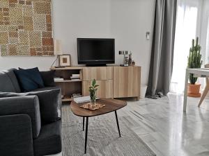 A television and/or entertainment centre at White Loft Alameda