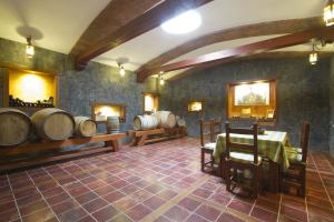 a large room with a bunch of wine barrels at Villa Remedios in Teguise