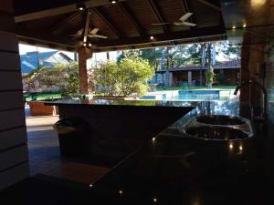 Бассейн в BauHouse Comfort Suites Asuncion или поблизости