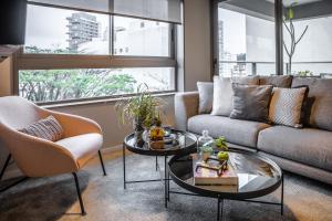 Uma área de estar em Noon Vila Madalena