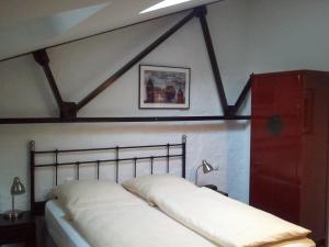Postel nebo postele na pokoji v ubytování Heldts Aparthotel