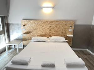 Postel nebo postele na pokoji v ubytování Bergamo Automatic Rooms Self check-in