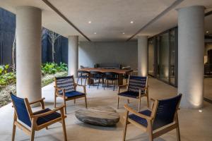 Uma área de estar em Noon Vila Madalena