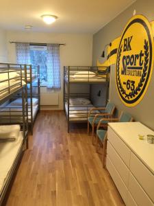 Postel nebo postele na pokoji v ubytování Eskilstuna Hostel