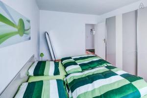 Ein Zimmer in der Unterkunft Ferienwohnung in Augsburg