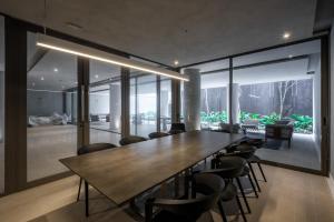 Uma área de estar em Noon Vila Madalena