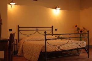 Voodi või voodid majutusasutuse Agriturismo Bagnolo toas