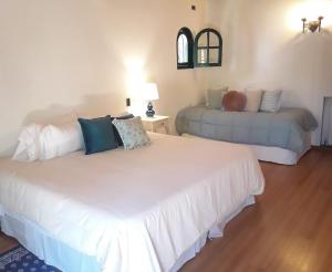 Cama ou camas em um quarto em Casona La Chiquita