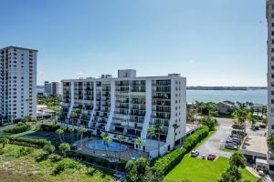 an aerial view of a building in front of the ocean at Landmark Towers 203 in Clearwater Beach