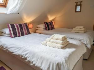 Llit o llits en una habitació de Lephin Cottage