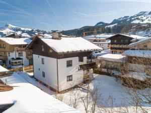 a view of a town in the snow at Berg und Bach in Kirchberg in Tirol