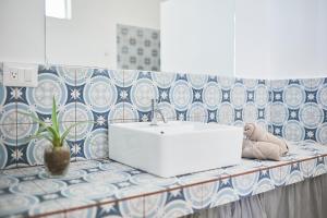 Posezení v ubytování Villa Casa Azul & Arena Blanca Apartamentos + 37 fotografií