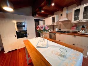 Kuchyň nebo kuchyňský kout v ubytování Dolomiti Bellunesi - Luxury Loft a Feltre