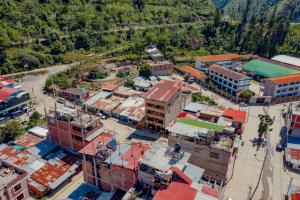 an aerial view of a city with buildings at Yacumama Santa Teresa in Santa Teresa