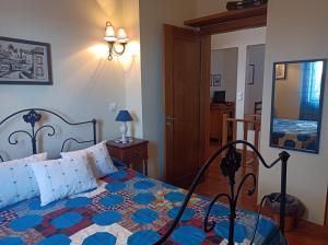 Postel nebo postele na pokoji v ubytování Carapacho Rooms
