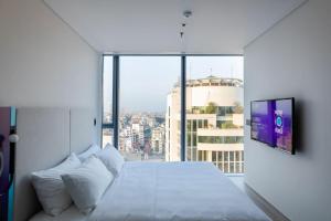 Tru by Hilton Hanoi Station客房内的一张或多张床位