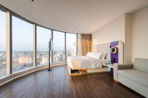 Tru by Hilton Hanoi Station客房内的一张或多张床位