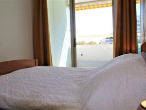 Posteľ alebo postele v izbe v ubytovaní Bel appartement 3 pièces avec terrasse et parking à Villeneuve-Loubet Plage - FR-1-252A-84