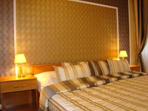 Posteľ alebo postele v izbe v ubytovaní Hotel Saint Petersburg