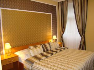 Posteľ alebo postele v izbe v ubytovaní Hotel Saint Petersburg