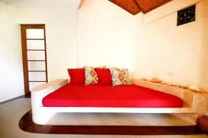 Postel nebo postele na pokoji v ubytování Signature Boracay Punta Rosa