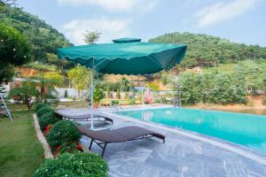 Bazén v ubytování Cosy House - Venuestay nebo v jeho okolí