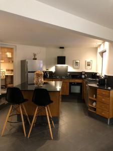 Kuchyň nebo kuchyňský kout v ubytování Villa spa Grand Anse