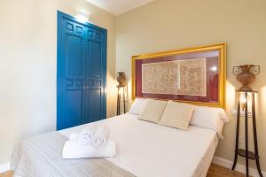 Postel nebo postele na pokoji v ubytování Hotel Albaicín