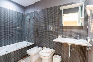 Koupelna v ubytování Hotel Albaicín