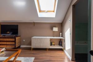 TV a/nebo společenská místnost v ubytování Hotel Albaicín