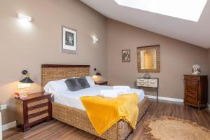 Postel nebo postele na pokoji v ubytování Hotel Albaicín
