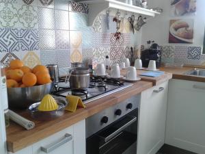 Kuchyň nebo kuchyňský kout v ubytování Tenuta Don Paolino