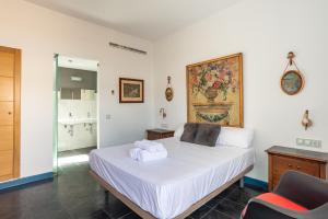 Postel nebo postele na pokoji v ubytování Hotel Albaicín