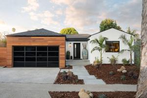 a modern house with a garage at Tropical Beach Villa with Deck, Spa Walk to Ocean in Santa Barbara