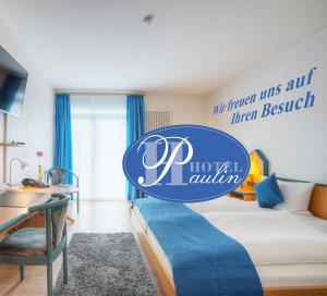 Postel nebo postele na pokoji v ubytování Paulin Hotel Trier