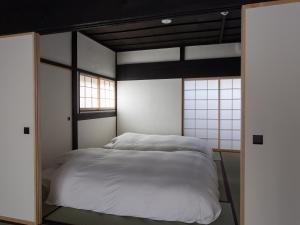古民家の宿 Soliiにあるベッド