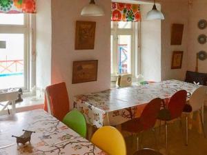 a dining room with a table and chairs at Holiday home Bruvik in Bruvik