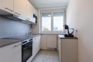 Kuchnia lub aneks kuchenny w obiekcie Appartement Graz - Ihr erstklassiges Zuhause fernab von Zuhause