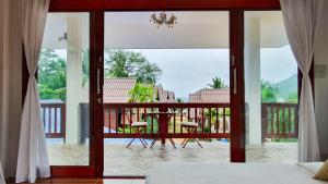 Balkón nebo terasa v ubytování Baan Bhuwann Holiday Apartment