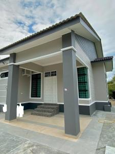 a small house is shown with at Homestay Ummi D'Pauh in Kota Bharu