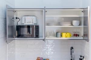 Cucina o angolo cottura di Port O' Call Motel