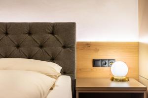 Posteľ alebo postele v izbe v ubytovaní Residence Skutial App Santner