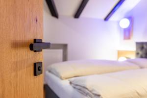 Posteľ alebo postele v izbe v ubytovaní Residence Skutial App Santner